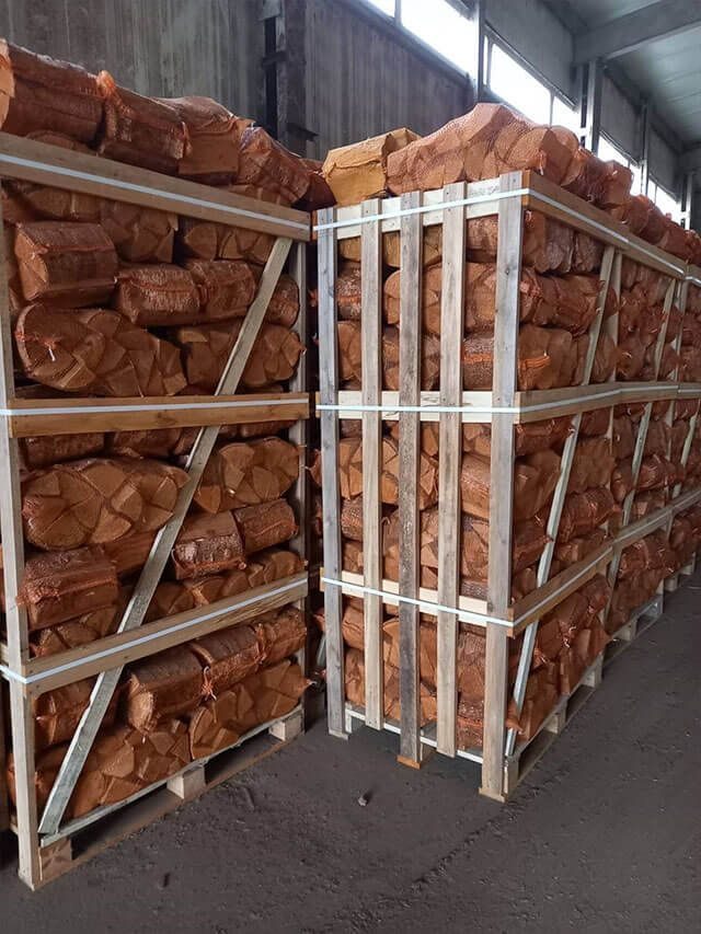 Nets of kiln-dried firewood on a pallet